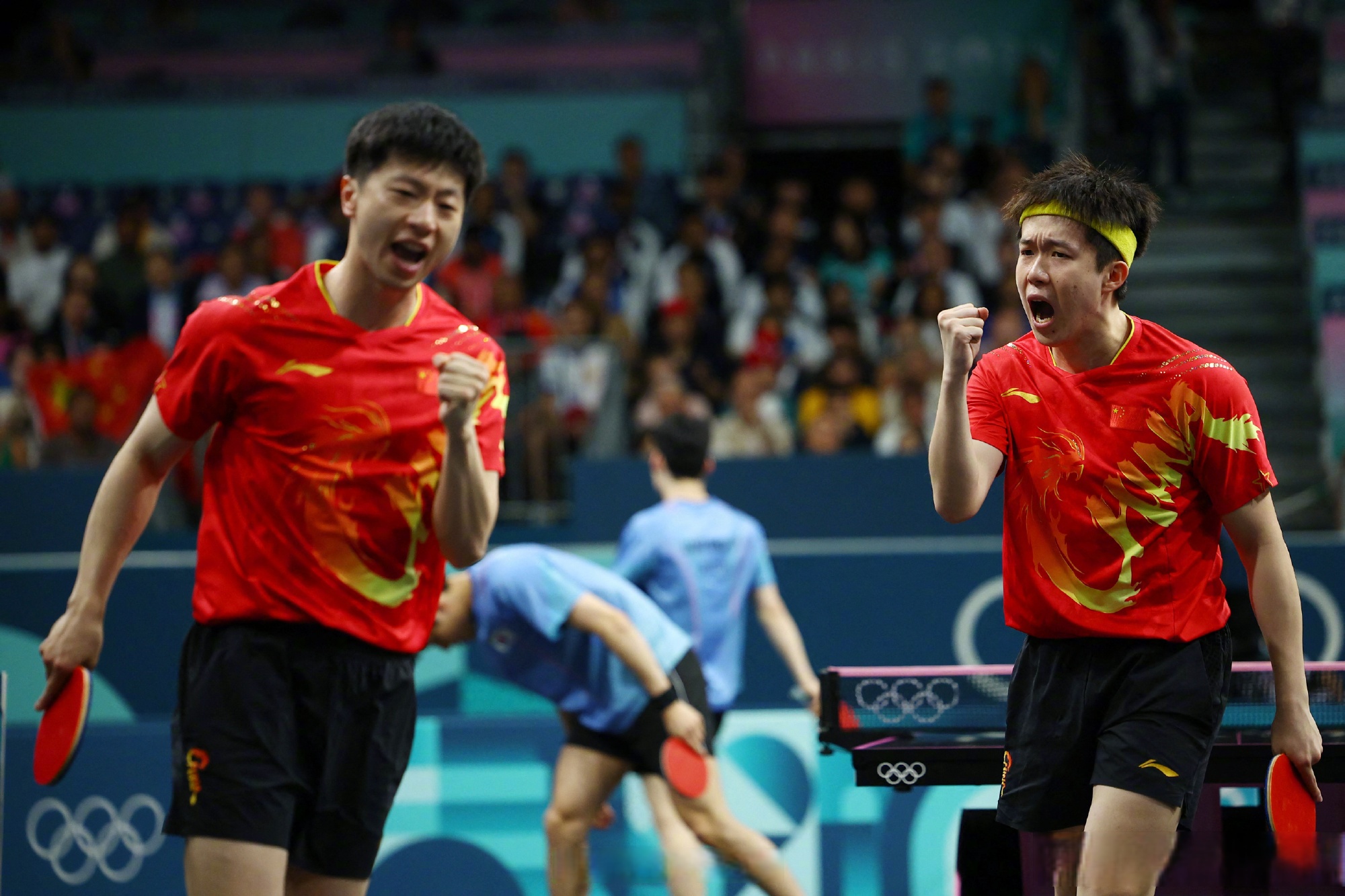 比利时乒乓球队轻取韩国乒乓球队，马龙关键制胜